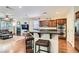 Open kitchen with breakfast bar, granite countertops, and stainless steel appliances at 9192 Moose Country Pl, Las Vegas, NV 89178