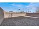 Low maintenance backyard with stone pavers, rock landscaping and a block fence at 9330 Brookmont Ave, Las Vegas, NV 89149