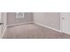 Clean, carpeted bedroom with modern trim, perfect for relaxation at 9330 Brookmont Ave, Las Vegas, NV 89149