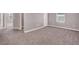 Spacious carpeted bedroom with large windows offering natural light at 9330 Brookmont Ave, Las Vegas, NV 89149