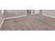 Spacious carpeted bedroom with ample walk-in closet space at 9330 Brookmont Ave, Las Vegas, NV 89149
