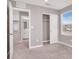 Comfortable carpeted bedroom with closet and bright window at 9330 Brookmont Ave, Las Vegas, NV 89149