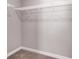 Walk in closet with gray walls, neutral carpet, and white shelving at 9330 Brookmont Ave, Las Vegas, NV 89149
