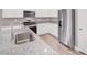 Modern kitchen featuring stainless steel appliances and granite countertops at 9330 Brookmont Ave, Las Vegas, NV 89149