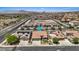 Wide aerial view of homes showcasing their roof styles, landscaping, and neighborhood layout at 1008 New Creek Ave, Henderson, NV 89015