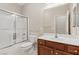 Bathroom featuring a shower over tub, vanity and neutral walls at 1008 New Creek Ave, Henderson, NV 89015