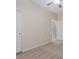 Bright bedroom with two doors and neutral walls at 1008 New Creek Ave, Henderson, NV 89015