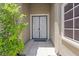 Inviting front entrance features a decorative security gate and a well-maintained walkway at 1008 New Creek Ave, Henderson, NV 89015