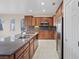 Kitchen with stainless steel appliances and granite countertop island at 1008 New Creek Ave, Henderson, NV 89015
