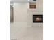Living room with fireplace and tiled floor at 1008 New Creek Ave, Henderson, NV 89015