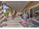 Inviting covered patio with stylish furnishings offers great space for relaxing and outdoor entertaining at 1008 New Creek Ave, Henderson, NV 89015