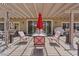 Elegant covered patio features designer furnishings creating a welcoming outdoor living area at 1008 New Creek Ave, Henderson, NV 89015