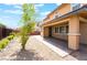 Backyard featuring a patio with brick flooring and low-maintenance landscaping in a desirable setting at 10315 Turia Gardens Rd, Las Vegas, NV 89135