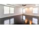 Large primary bedroom featuring a ceiling fan, recessed lighting, and bright windows at 10315 Turia Gardens Rd, Las Vegas, NV 89135