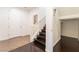 Warm and bright foyer with tile flooring and a stairway with wood steps at 10315 Turia Gardens Rd, Las Vegas, NV 89135