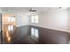 Large main bedroom boasts hardwood floors, lots of natural light and a ceiling fan at 10315 Turia Gardens Rd, Las Vegas, NV 89135