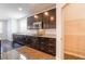 Kitchen view featuring granite countertops, stainless steel appliances, and a walk-in pantry at 10315 Turia Gardens Rd, Las Vegas, NV 89135