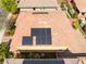 Aerial view of a tile rooftop with solar panels, showing quality construction and energy efficiency at 10315 Turia Gardens Rd, Las Vegas, NV 89135