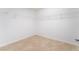 Walk-in closet features white walls and tile flooring at 10315 Turia Gardens Rd, Las Vegas, NV 89135