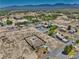 Expansive aerial view showcases the home's location within a tranquil desert community and mountain views at 1190 W Sierra Vista Cir, Pahrump, NV 89060