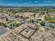 Nevada property with full perimeter fence, desert landscape and outbuilding at 1190 W Sierra Vista Cir, Pahrump, NV 89060