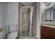 Bathroom showcasing a glass-enclosed shower and vanity with sink at 1190 W Sierra Vista Cir, Pahrump, NV 89060