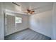 Bedroom with white walls, wood-look flooring, and a window at 1190 W Sierra Vista Cir, Pahrump, NV 89060