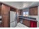 Close up of the stainless steel appliances, granite countertops and custom cabinets in the kitchen at 1190 W Sierra Vista Cir, Pahrump, NV 89060