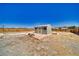 A charming outbuilding featuring a brick patio, windows, and a secure fenced yard for privacy at 1190 W Sierra Vista Cir, Pahrump, NV 89060