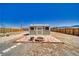 View of an outbuilding offering a cozy brick patio with fenced yard and great potential for outdoor use at 1190 W Sierra Vista Cir, Pahrump, NV 89060