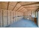 Clean, spacious interior of the outbuilding, featuring built-in shelving and a concrete floor at 1190 W Sierra Vista Cir, Pahrump, NV 89060