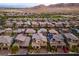 A high angle view of a neighborhood located near mountains in a desert environment at 12367 Aster Hills Ave, Las Vegas, NV 89138