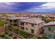 Sunset aerial view of new home community with lush landscaping and private yards at 12367 Aster Hills Ave, Las Vegas, NV 89138