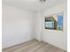 A bright bedroom with a large window providing a beautiful view at 12367 Aster Hills Ave, Las Vegas, NV 89138