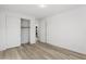 Open bedroom features closet, wood flooring and neutral walls at 12367 Aster Hills Ave, Las Vegas, NV 89138
