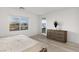 Serene bedroom featuring wood floors, cozy bed, dresser and scenic view with a relaxing atmosphere at 12367 Aster Hills Ave, Las Vegas, NV 89138