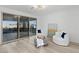 Bright sitting room with mountain views, neutral colors, and modern furnishings at 12367 Aster Hills Ave, Las Vegas, NV 89138