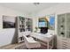 Stylish office space with modern desk, shelving, and bright natural light at 12367 Aster Hills Ave, Las Vegas, NV 89138