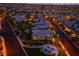 An aerial view of a community with solar panels, lush landscaping, and neighborhood park at 12404 Aster Hills Ave, Las Vegas, NV 89138