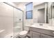 The bathroom features a standing shower with sleek glass doors at 12404 Aster Hills Ave, Las Vegas, NV 89138