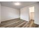 Spacious bedroom with neutral walls, wood floors, and closet access at 12404 Aster Hills Ave, Las Vegas, NV 89138