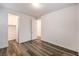 This bedroom offers ample closet space and modern wood-look floors at 12404 Aster Hills Ave, Las Vegas, NV 89138