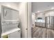 This modern kitchen features stainless steel appliances and neutral gray cabinets at 12404 Aster Hills Ave, Las Vegas, NV 89138