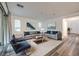 Spacious living room with contemporary furnishings, neutral tones, and ample natural light at 12404 Aster Hills Ave, Las Vegas, NV 89138