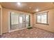 Private patio with brick floors that show access to the kitchen via the large sliding glass doors at 12404 Aster Hills Ave, Las Vegas, NV 89138