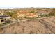 Aerial view of the neighborhood and home showcases desert landscaping at 1383 Opal Valley St, Henderson, NV 89052