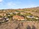 Scenic aerial view showcasing the neighborhood, desert landscape, and mountains in the distance at 1383 Opal Valley St, Henderson, NV 89052