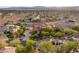 Gorgeous two-story home with meticulous landscaping, a circular driveway, and a tile roof at 1383 Opal Valley St, Henderson, NV 89052