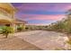 Spacious backyard featuring a patio, desert landscaping, and hillside views at 1383 Opal Valley St, Henderson, NV 89052