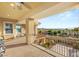 Outdoor balcony features seating area with views of mountain landscape and sunny skies at 1383 Opal Valley St, Henderson, NV 89052